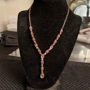 Necklace and bracelets.